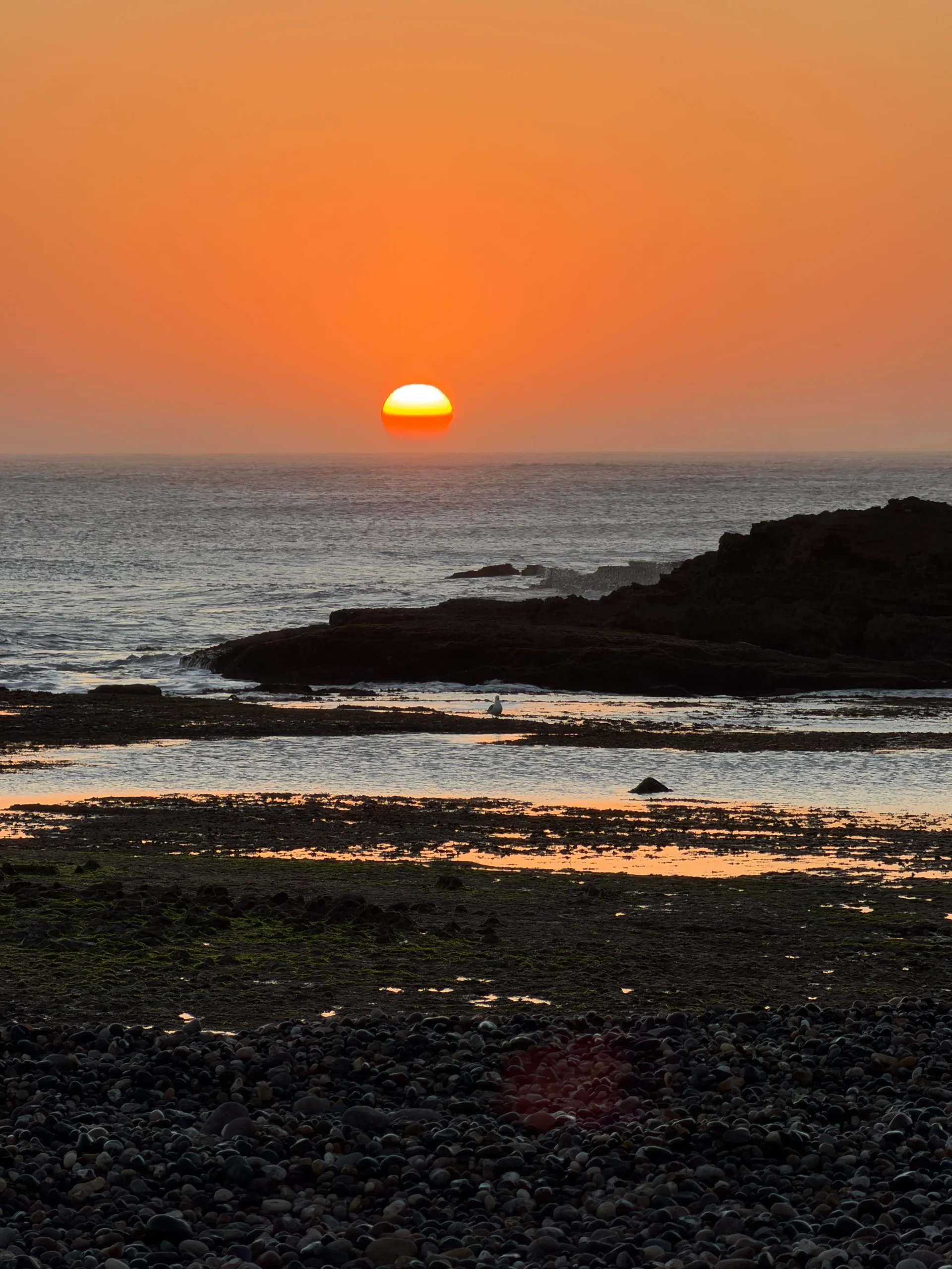 Sidi Kaouki beach sunset Atlantic Ocean near Essaouira Morocco